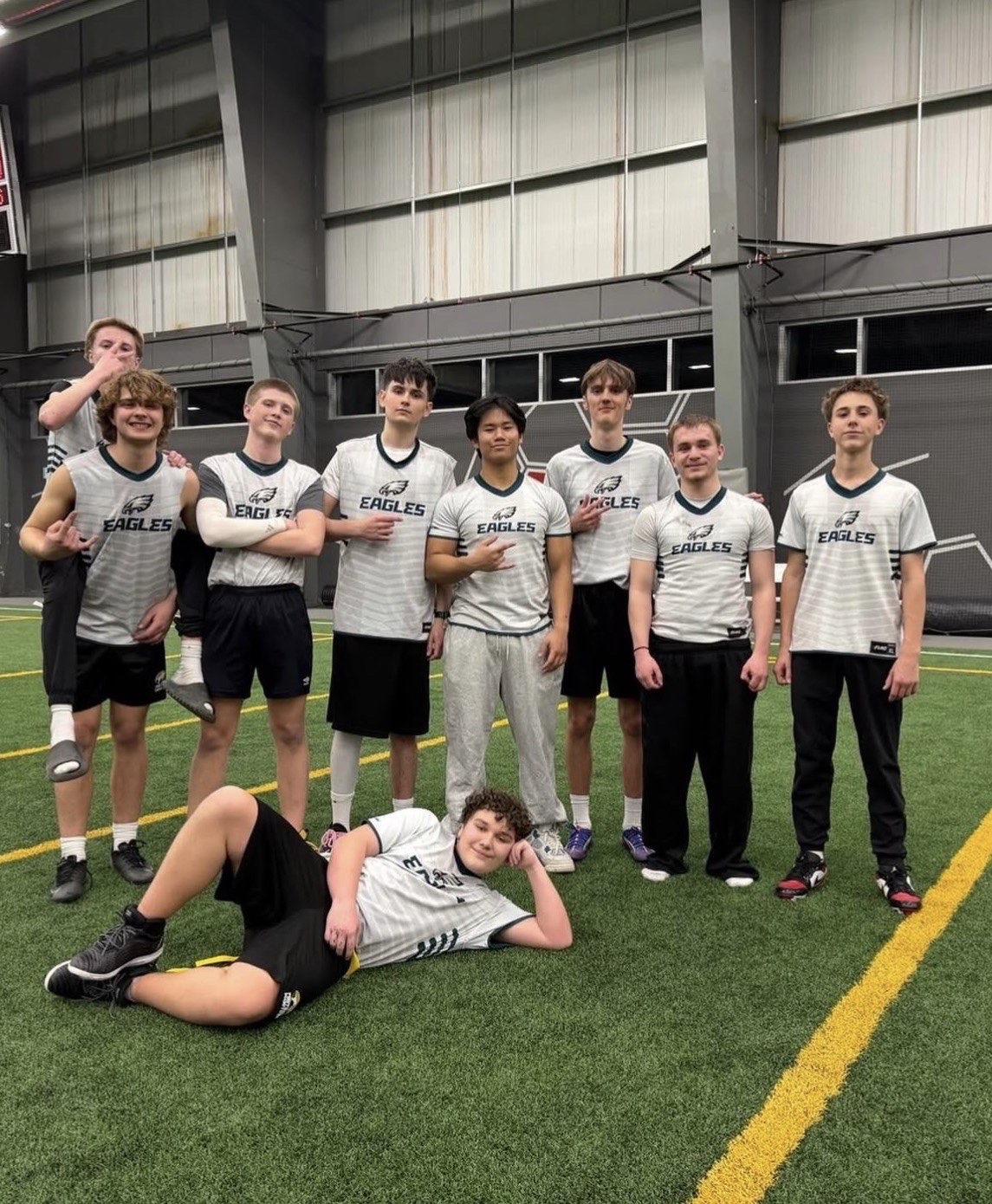 Royals team group photo on indoor turf in team jerseys